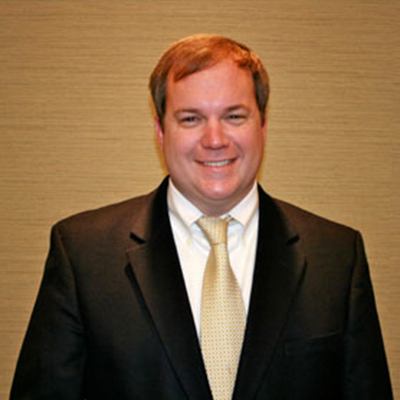 a man wearing a suit and tie