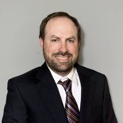 a man wearing a suit and tie